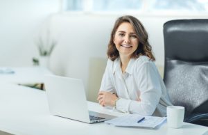 Young woman in office working